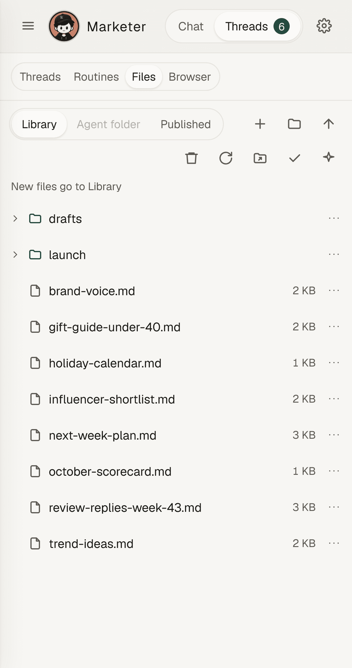 Files: the Marketer’s drafts and launch folders and eight finished documents.